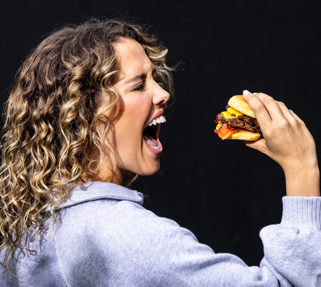 Woman with burger